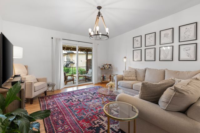 a living room with furniture or couch and a window