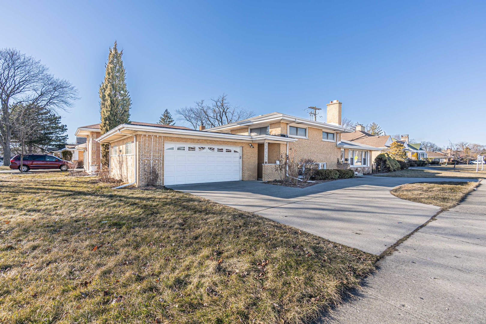 900 Devon Avenue Park Ridge, IL 60068 - Photo 26 of 30 a front view of a house with a yard