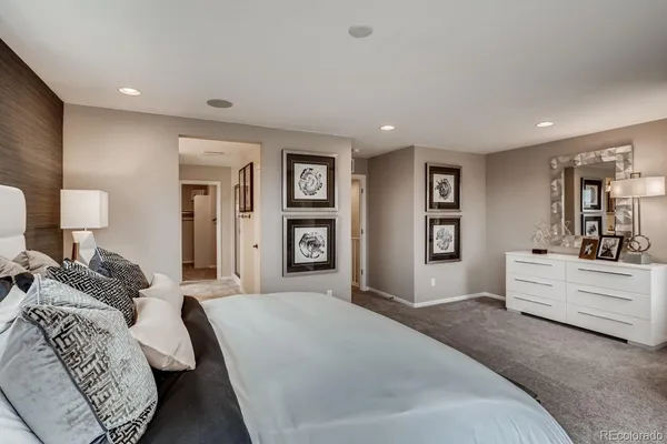 a room with a sink and a mirror