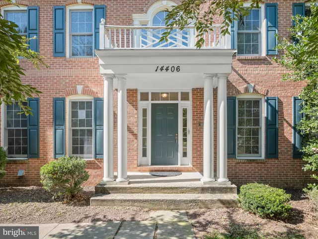 a view of a room with wooden floor and stairs