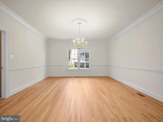 a kitchen with stainless steel appliances granite countertop a stove a refrigerator and a microwave