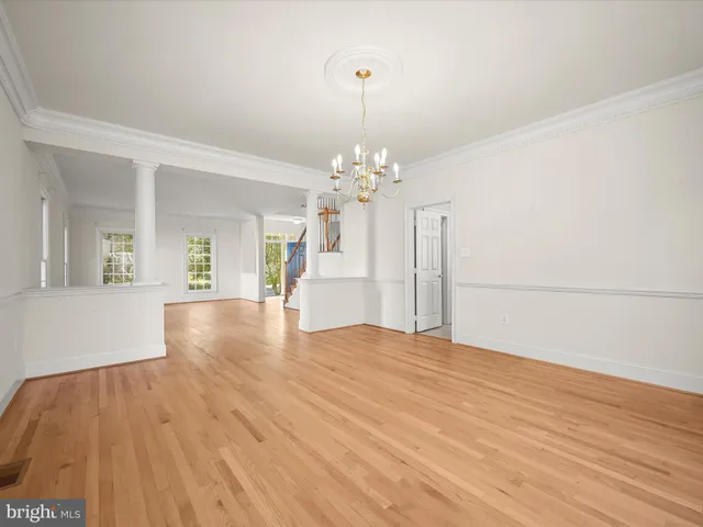 a kitchen with stainless steel appliances a refrigerator and a cabinets
