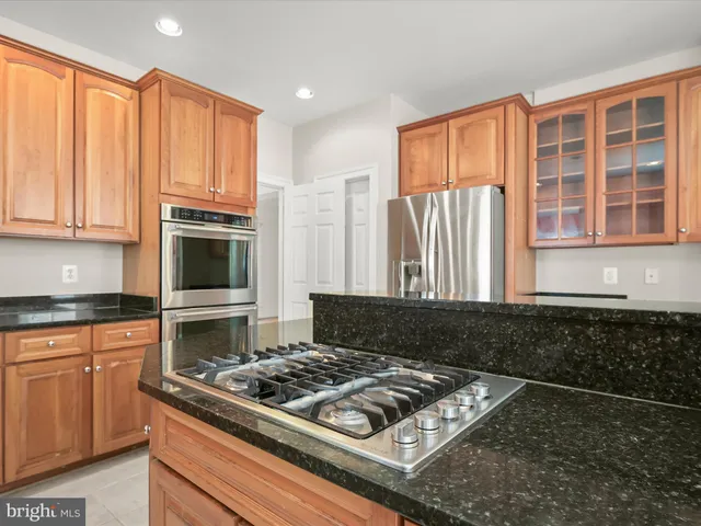 a view of a hallway with washer and dryer