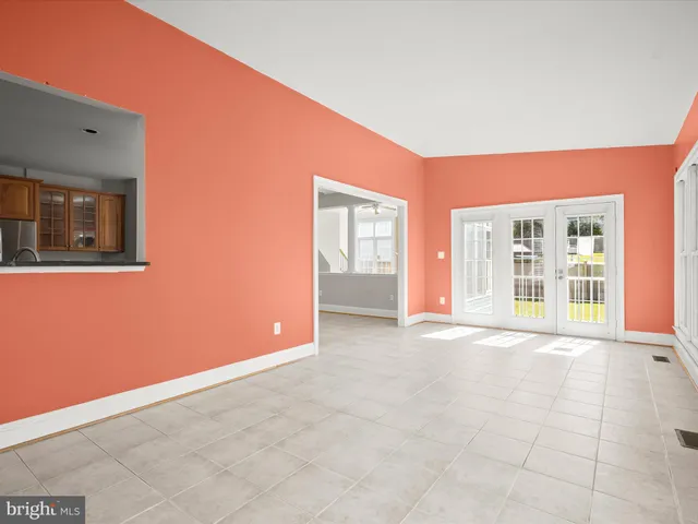 a bathroom with a sink vanity and a mirror