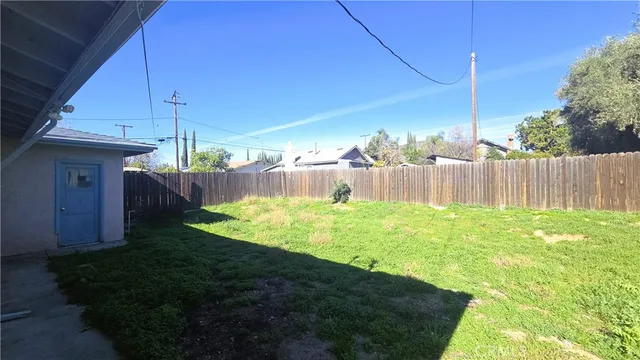 a view of a backyard with plants