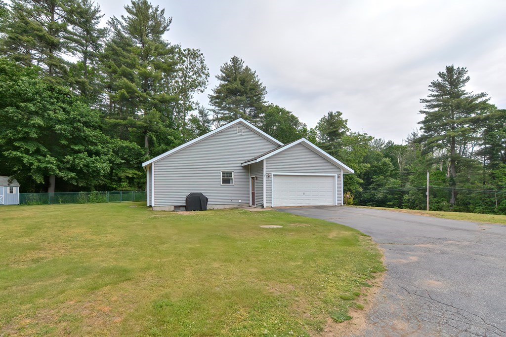 5 Salmon Brook Road Brookfield, MA 01506 - Photo 16 of 37 a view of a house with a yard and large trees