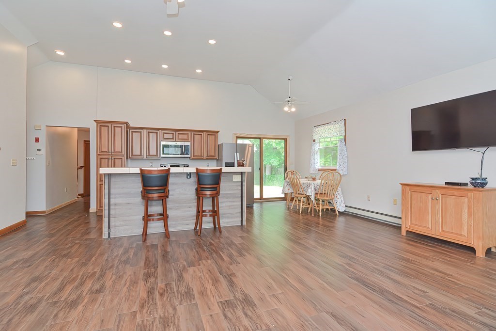 5 Salmon Brook Road Brookfield, MA 01506 - Photo 17 of 37 a living room with furniture and a flat screen tv