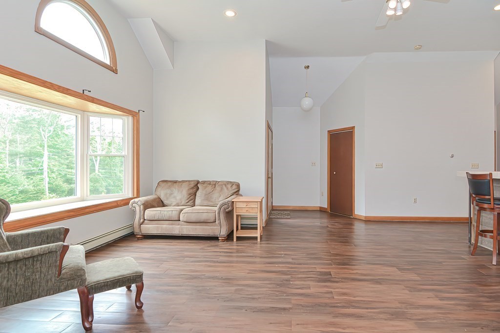 5 Salmon Brook Road Brookfield, MA 01506 - Photo 18 of 37 a living room with furniture and a large window