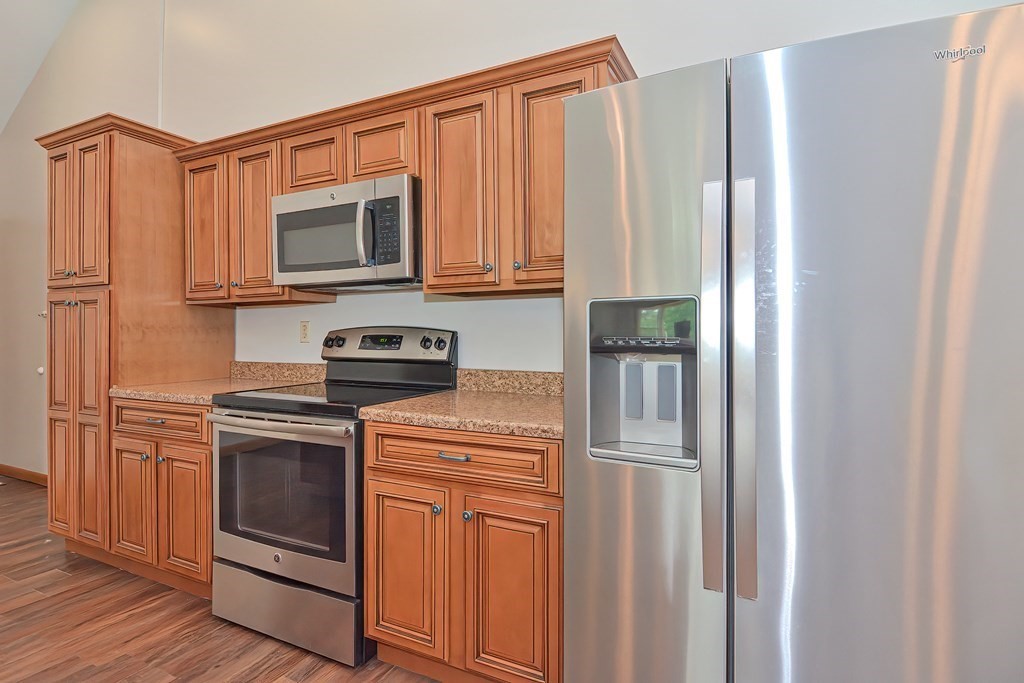 5 Salmon Brook Road Brookfield, MA 01506 - Photo 22 of 37 a kitchen with stainless steel appliances granite countertop a refrigerator stove and sink