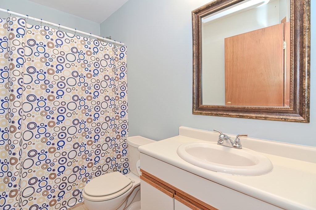 5 Salmon Brook Road Brookfield, MA 01506 - Photo 28 of 37 a bathroom with a sink toilet and mirror