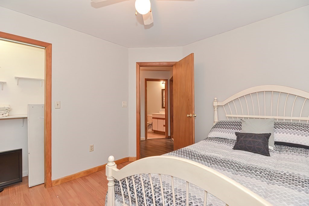 5 Salmon Brook Road Brookfield, MA 01506 - Photo 29 of 37 a bedroom with a bed and wooden floor
