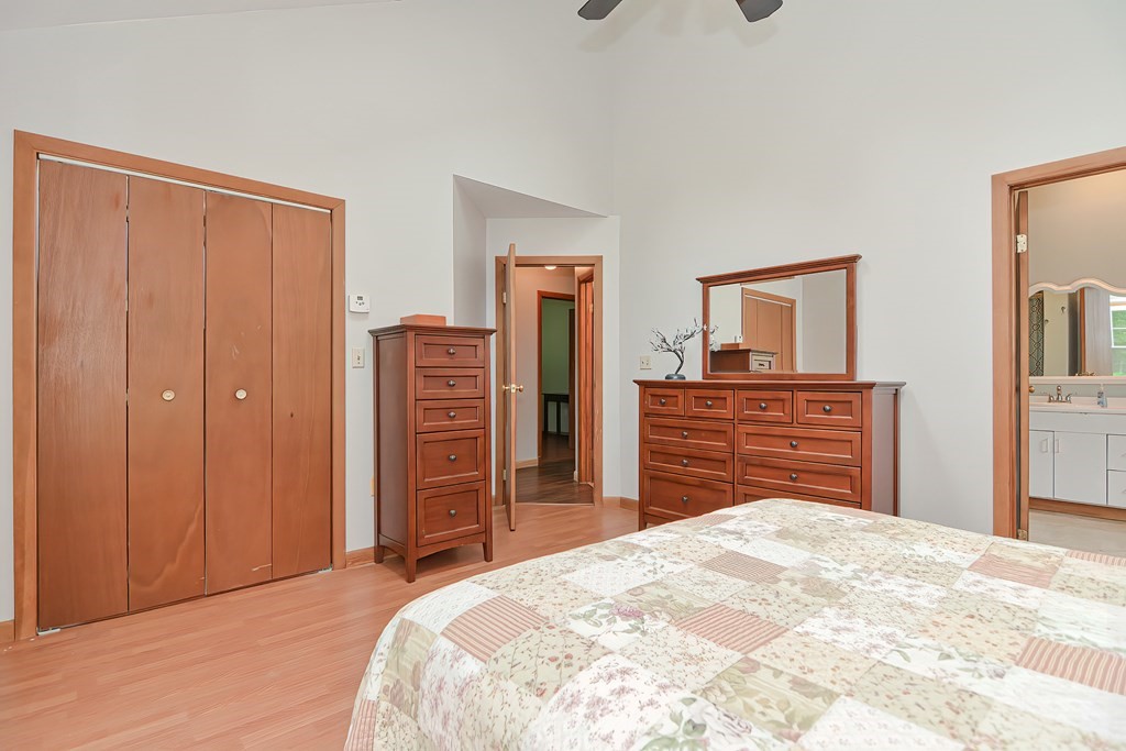 5 Salmon Brook Road Brookfield, MA 01506 - Photo 33 of 37 a bedroom with a bed and a dresser