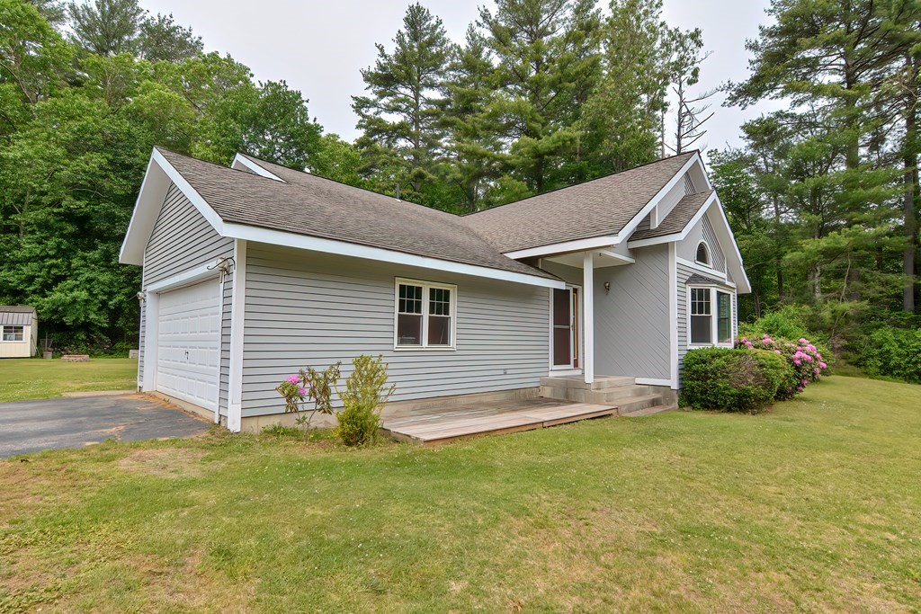 5 Salmon Brook Road Brookfield, MA 01506 - Photo 5 of 37 a view of a house with a yard and large tree