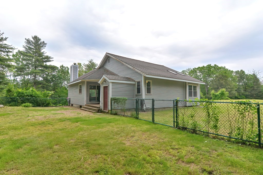 5 Salmon Brook Road Brookfield, MA 01506 - Photo 10 of 37 a view of a house with a yard and sitting area