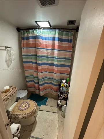 a bathroom with sink and mirror