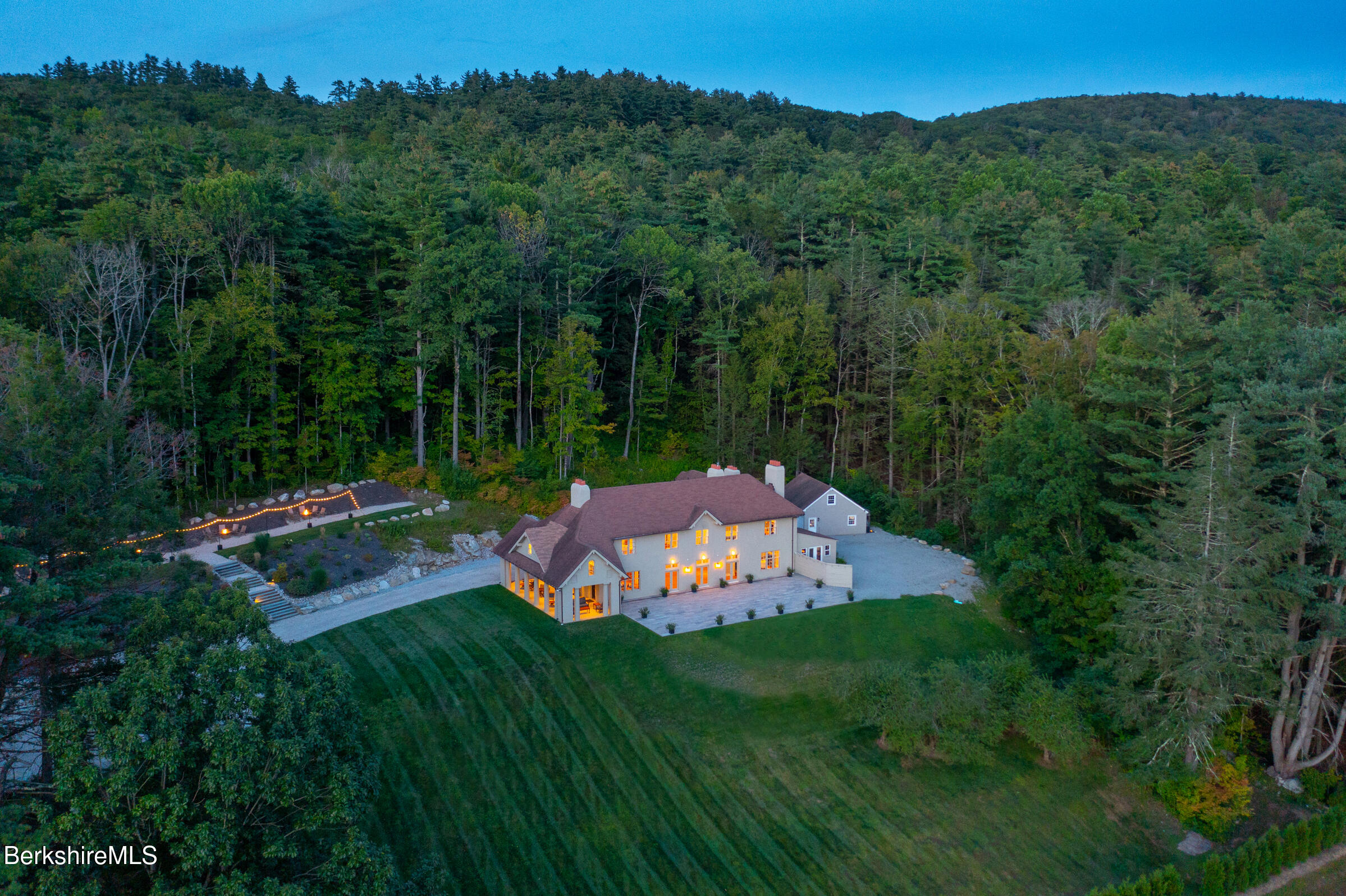 8 Webster Road Tyringham, MA 01264 - Photo 2 of 52 a view of a backyard with a garden and entertaining space