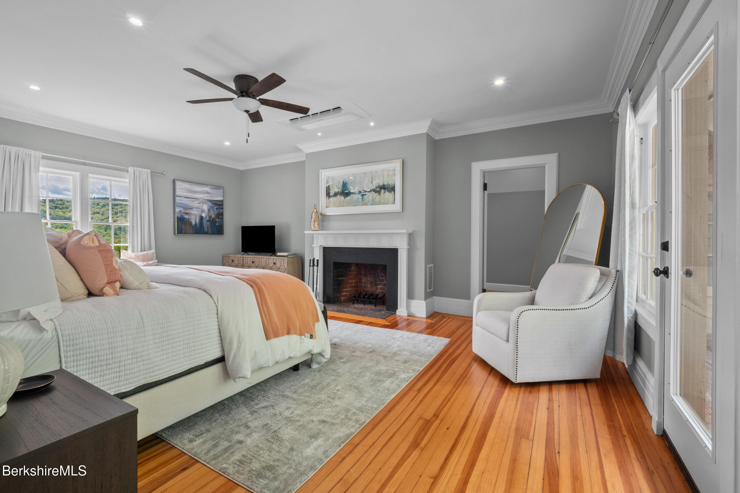 8 Webster Road Tyringham, MA 01264 - Photo 21 of 52 a bedroom with a large bed and a couch