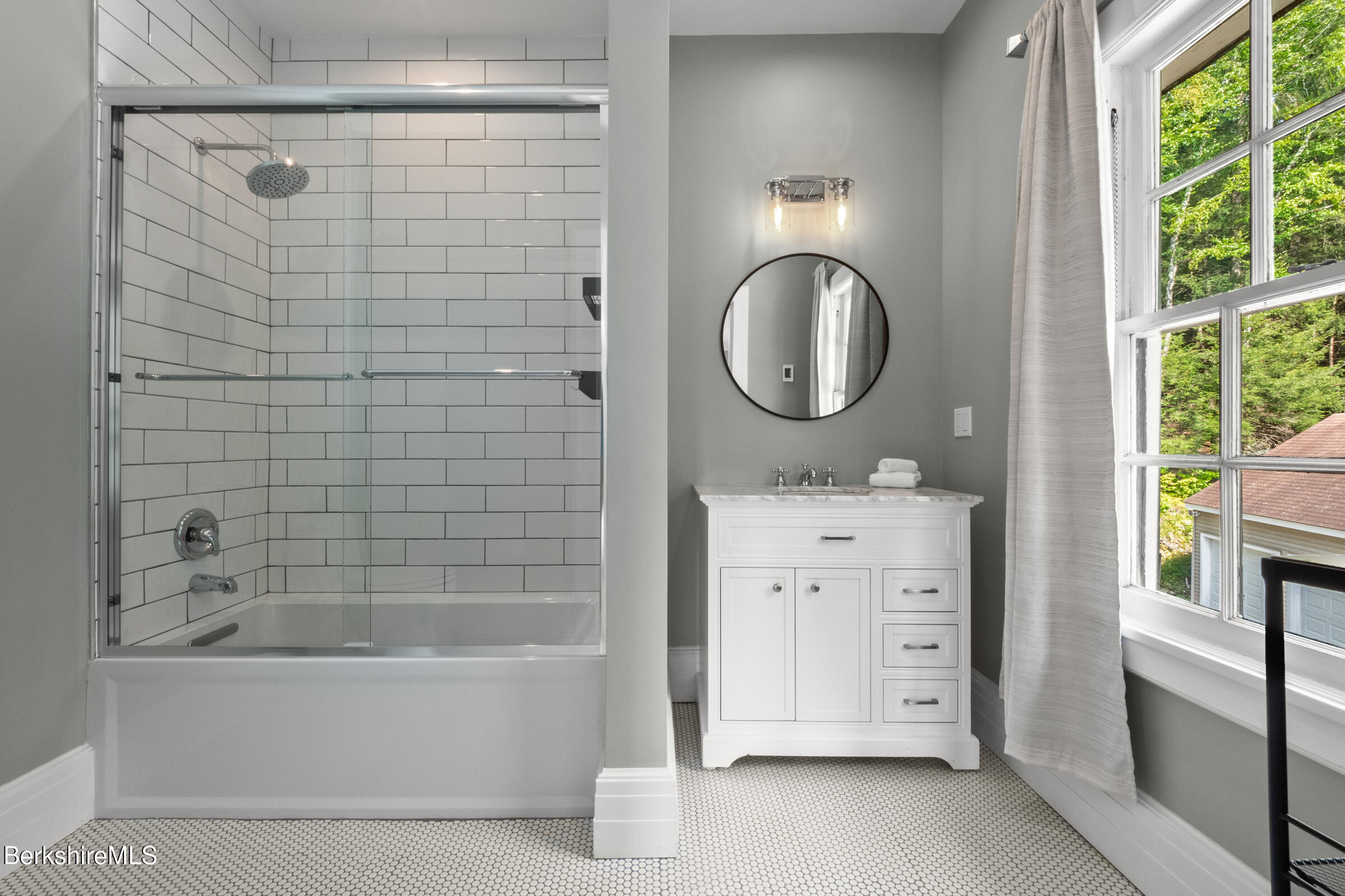 8 Webster Road Tyringham, MA 01264 - Photo 26 of 52 a bathroom with a sink a bathtub and a mirror