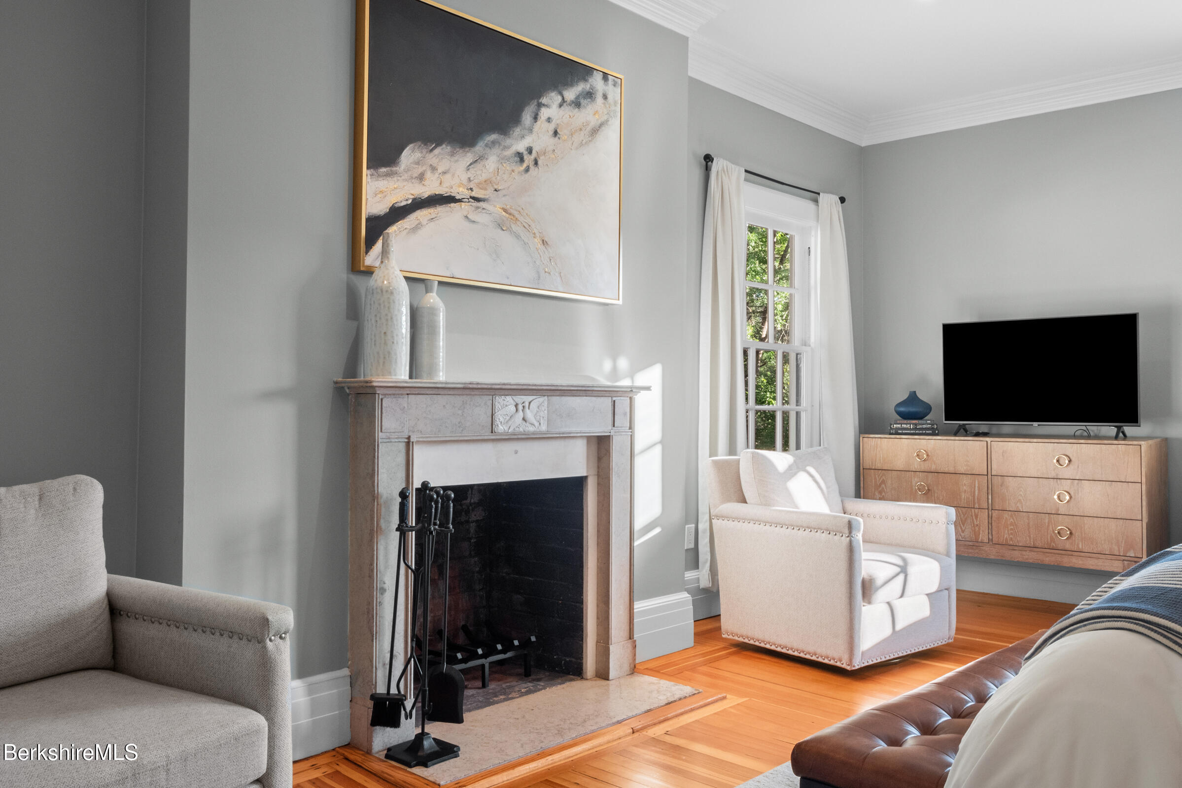 8 Webster Road Tyringham, MA 01264 - Photo 27 of 52 a living room with furniture and a flat screen tv