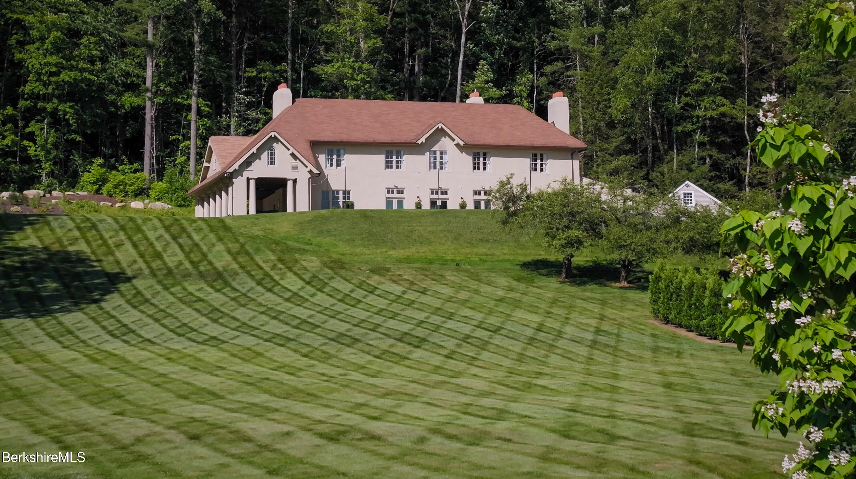 8 Webster Road Tyringham, MA 01264 - Photo 30 of 52 a aerial view of a house with yard and green space