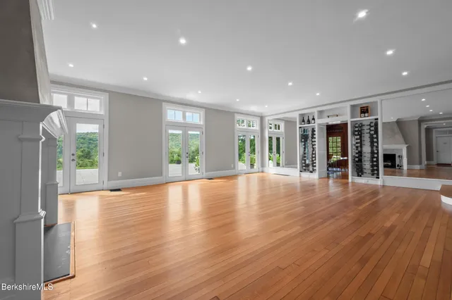 a view of a livingroom with furniture and a potted plant