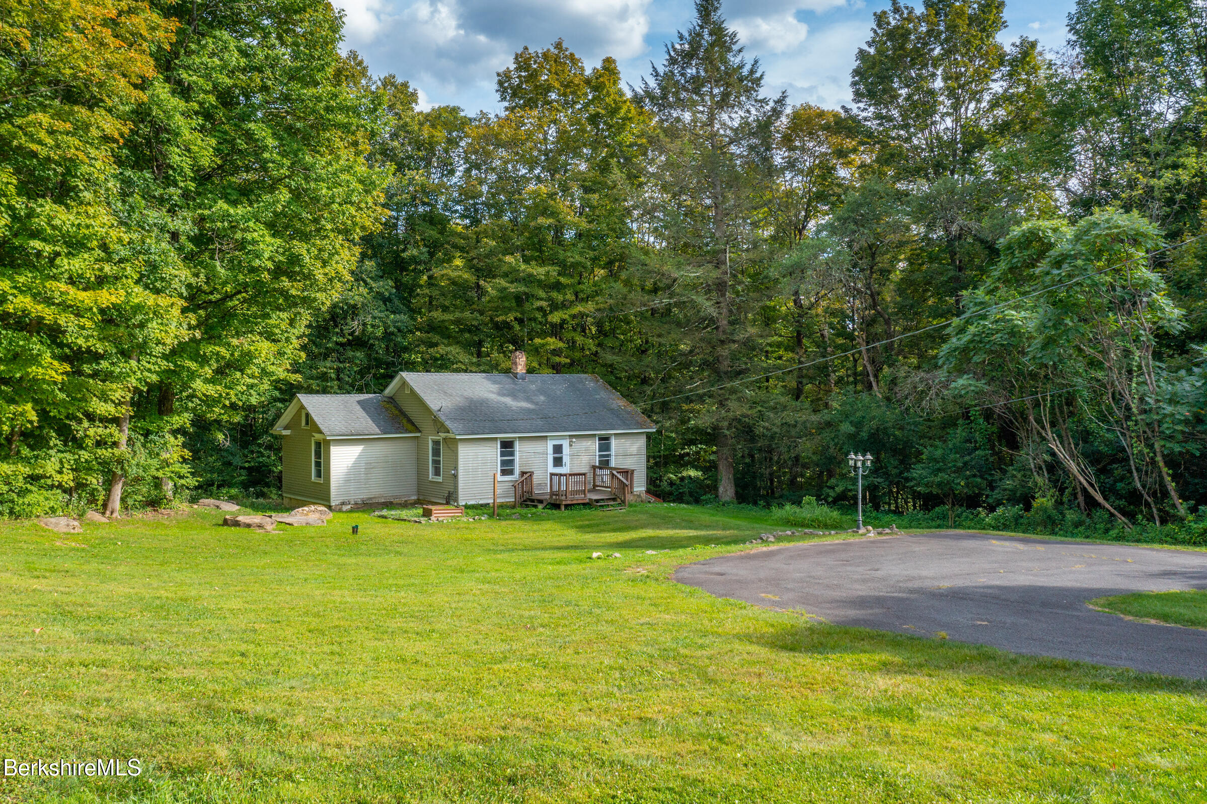 8 Webster Road Tyringham, MA 01264 - Photo 45 of 52 a view of a house with a big yard