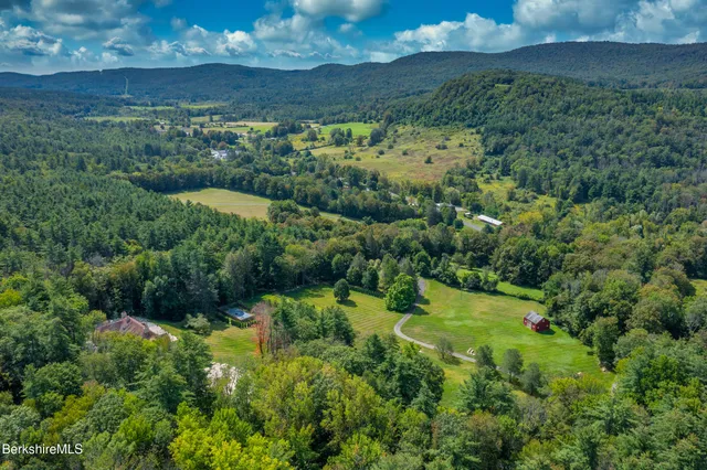 a view of an ocean with a house