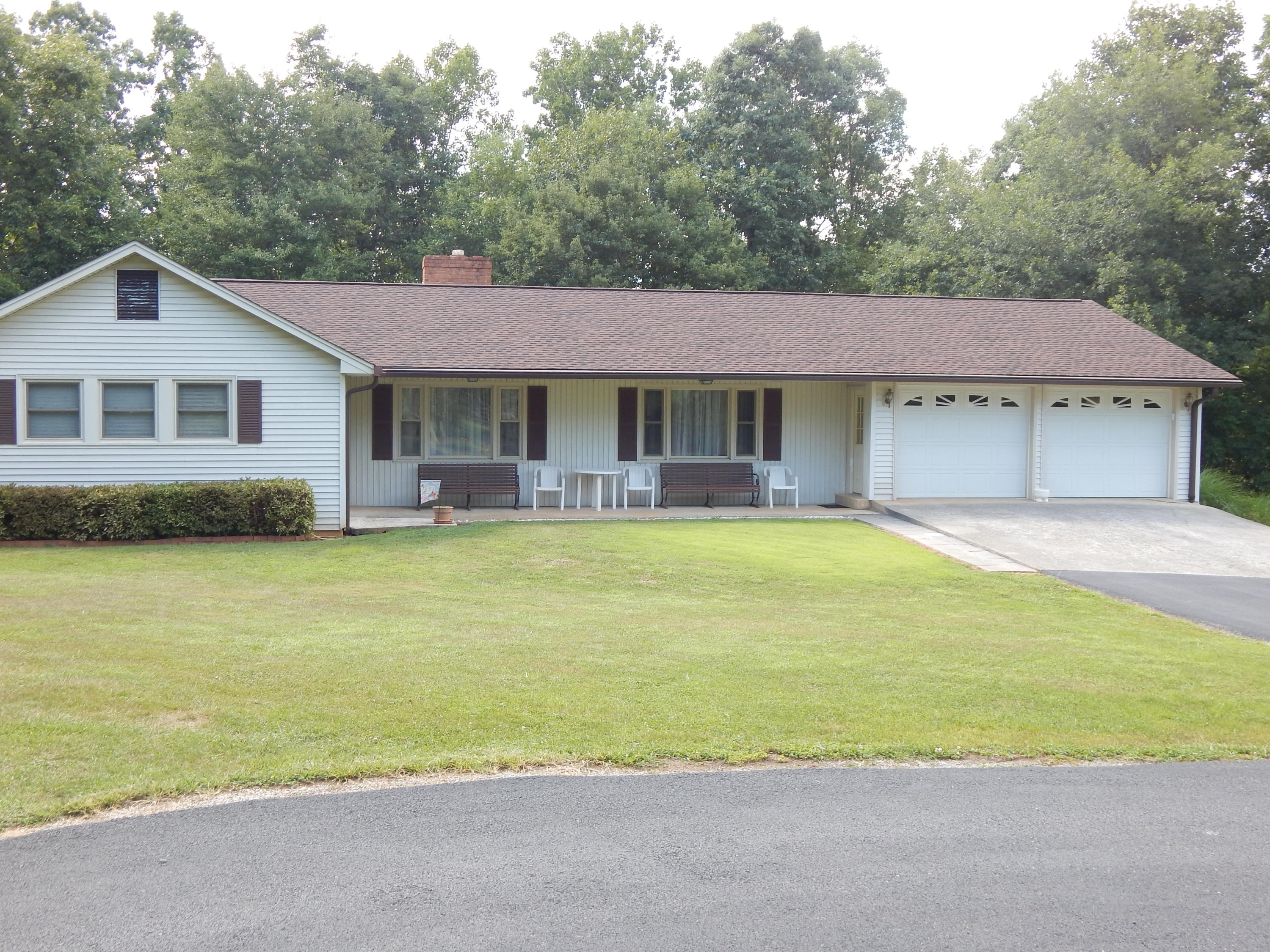 2805 Spradlin Road Vinton, VA 24179 - Photo 1 of 19 a house that has a lot of plants in it