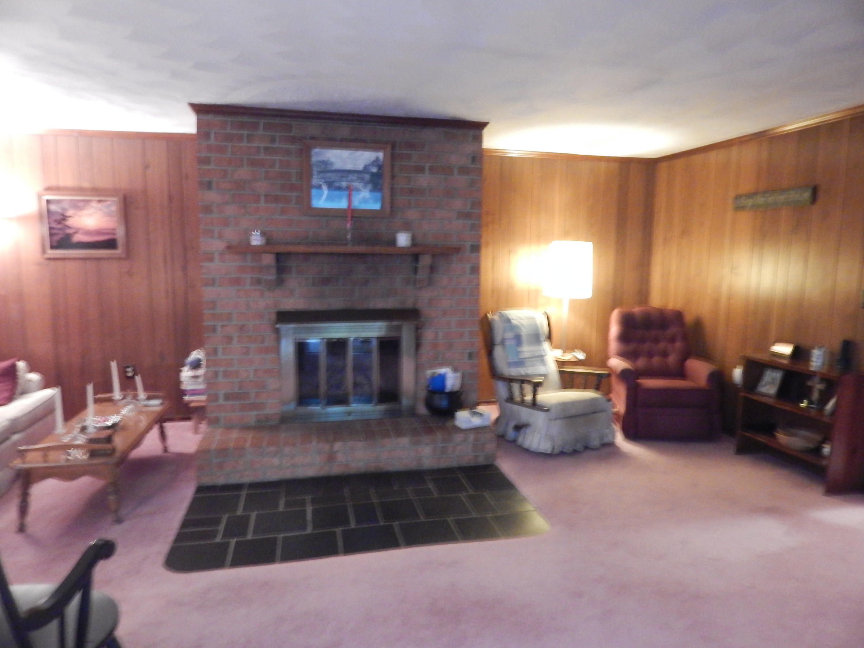 2805 Spradlin Road Vinton, VA 24179 - Photo 12 of 19 a living room with furniture and a fireplace