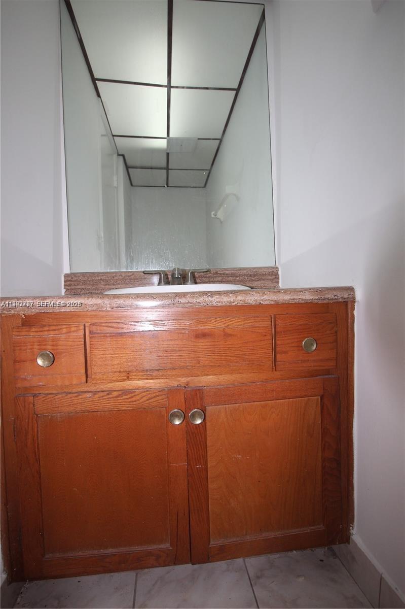 3680 Inverrary Drive, Unit 3D Lauderhill, FL 33319 - Photo 4 of 16 a close view of a refrigerator in the kitchen