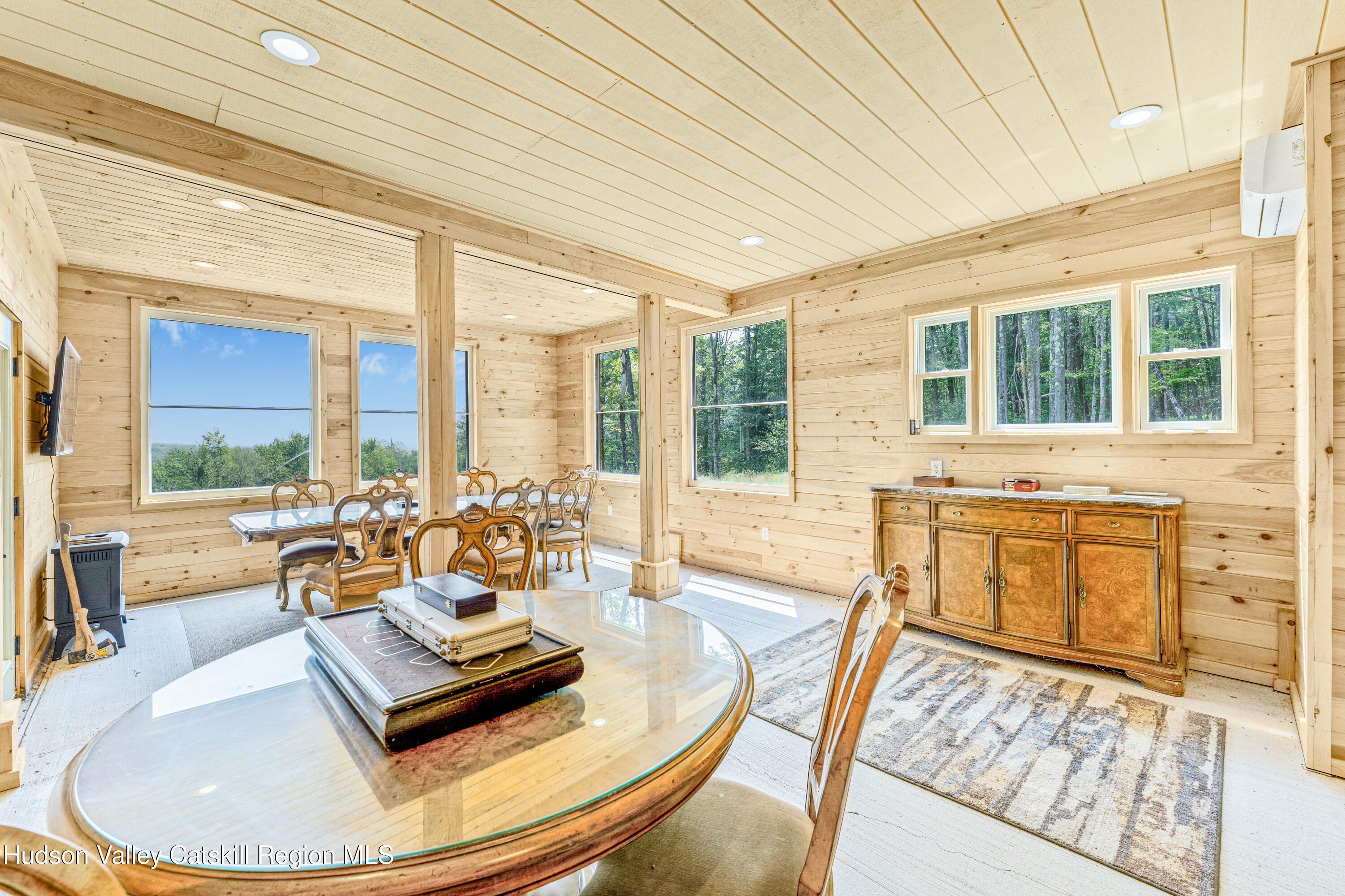 376 Aden Hill Road, Unit NEAR NEVERSINK RESERVOIR Neversink, NY 12768 - Photo 38 of 50 a living room with furniture and a large window