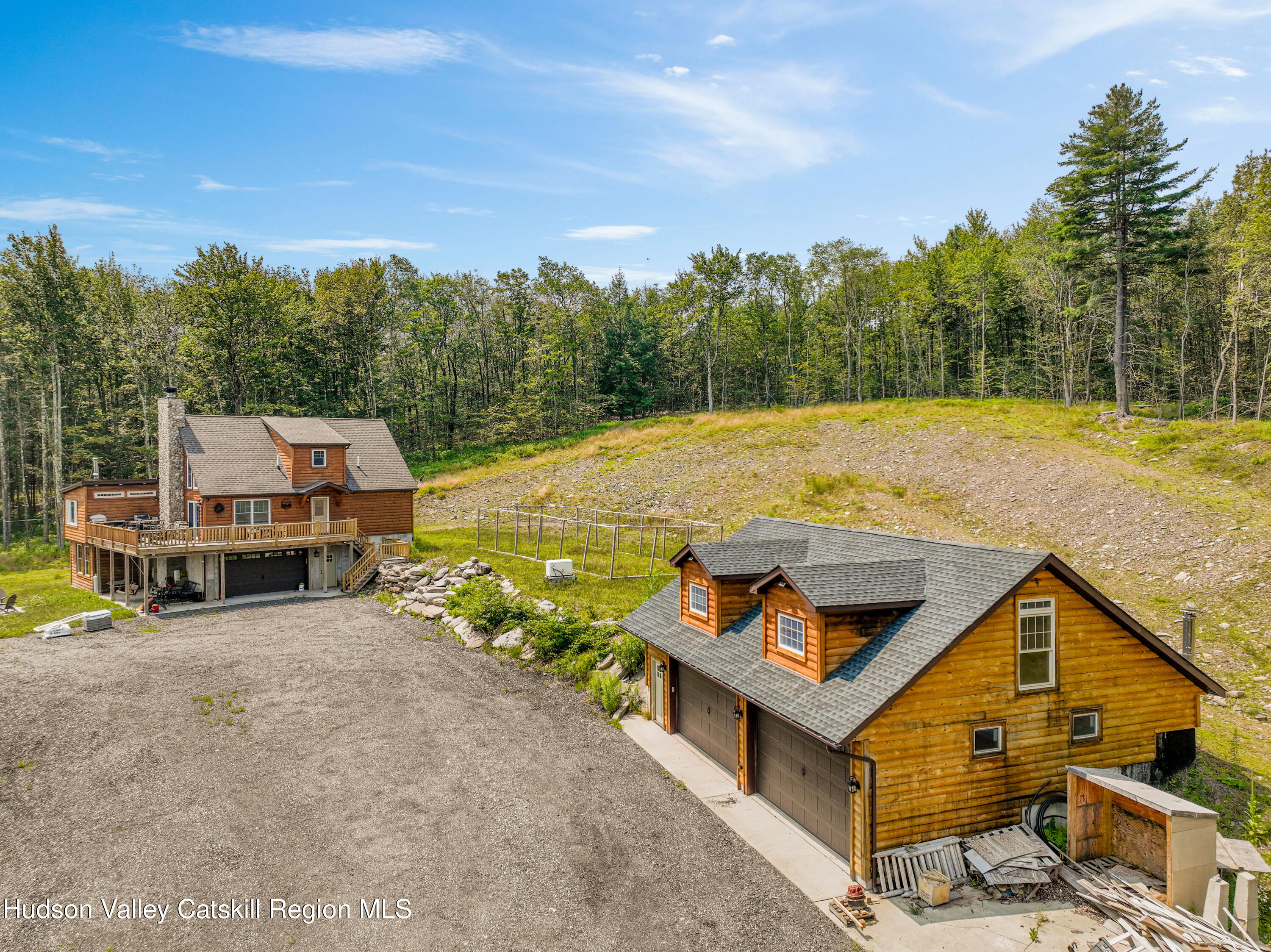 376 Aden Hill Road, Unit NEAR NEVERSINK RESERVOIR Neversink, NY 12768 - Photo 45 of 50 a view of a swimming pool with a lounge chairs