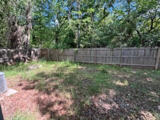 4744 Stokes Street Dallas, TX 75216 - Photo 15 of 20 a view of a backyard with a trees