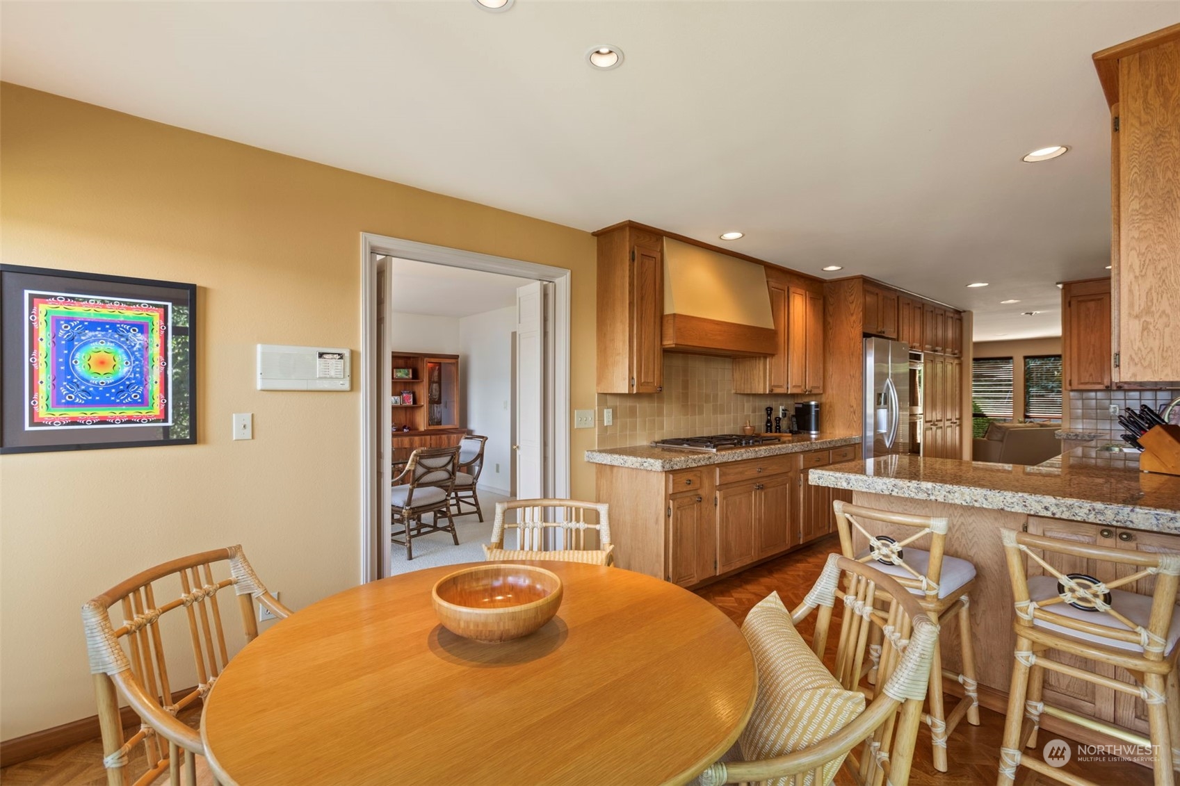 6244 East Mercer Way Mercer Island, WA 98040 - Photo 11 of 40 a kitchen with a table and chairs in it