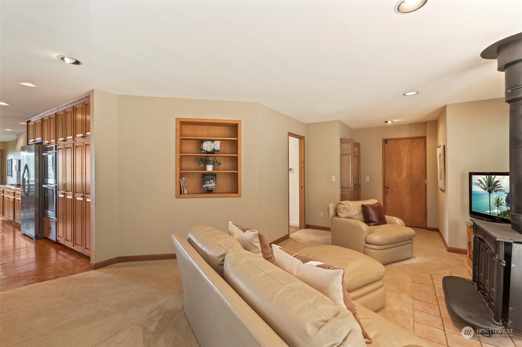 6244 East Mercer Way Mercer Island, WA 98040 - Photo 16 of 40 a living room with furniture and a flat screen tv