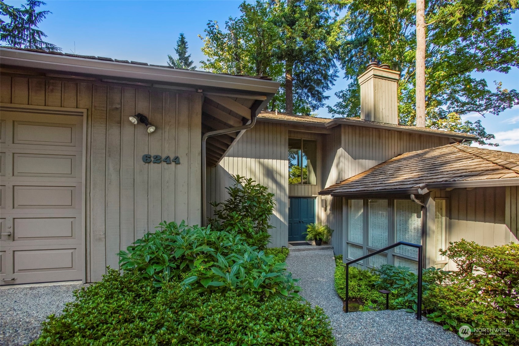 6244 East Mercer Way Mercer Island, WA 98040 - Photo 2 of 40 a view of a house with a patio