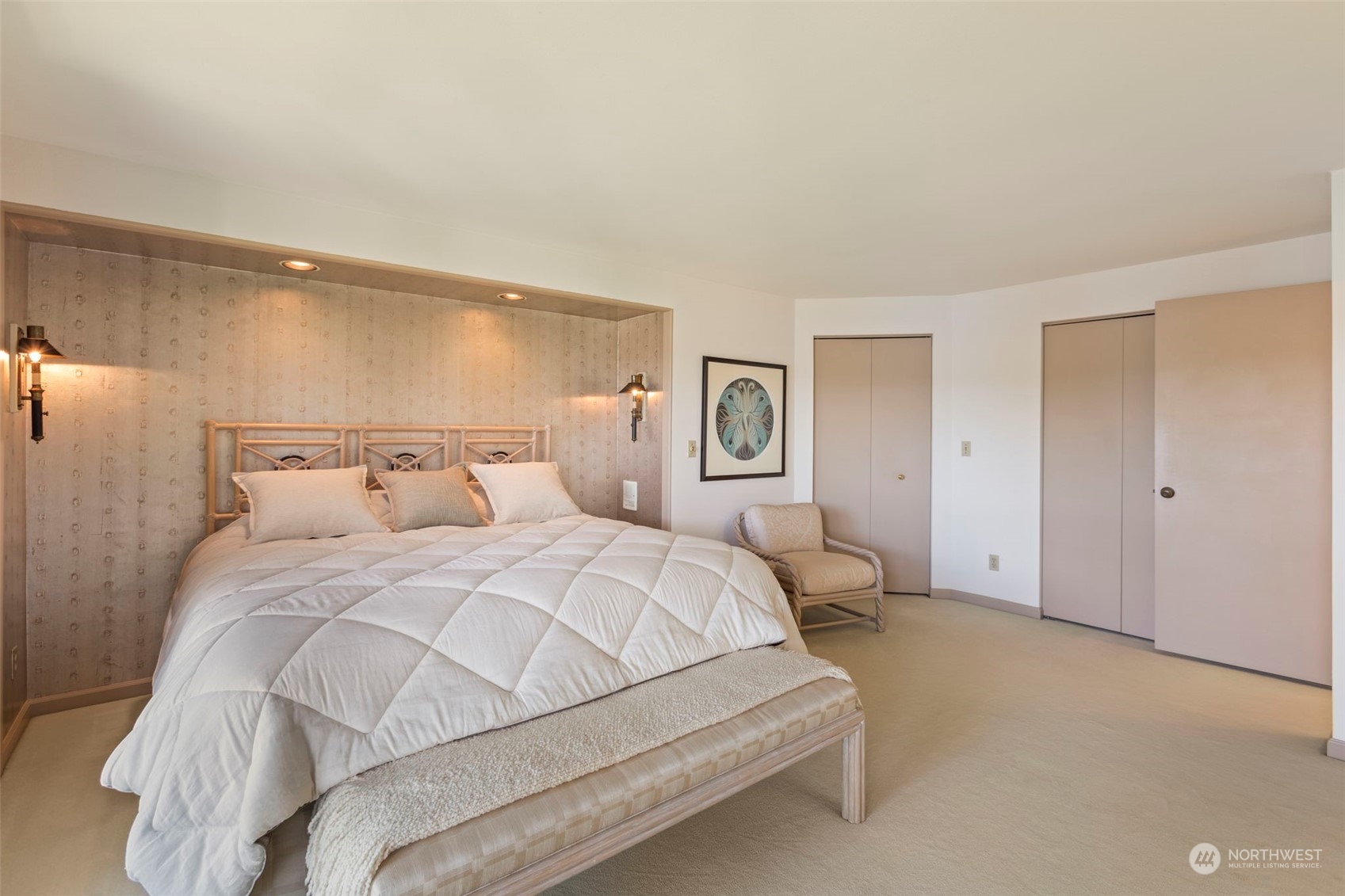 6244 East Mercer Way Mercer Island, WA 98040 - Photo 21 of 40 a bedroom with a bed and white walls