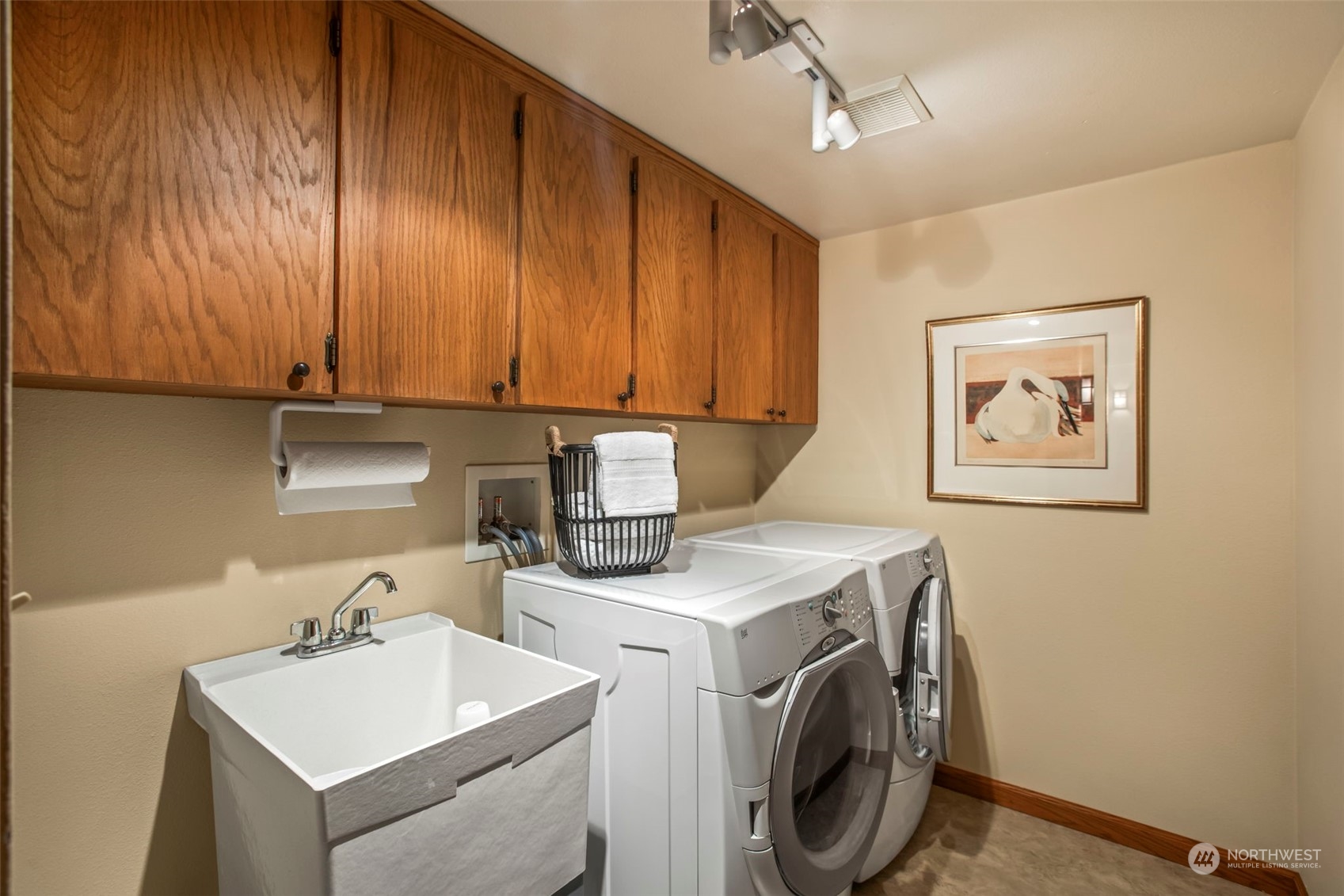 6244 East Mercer Way Mercer Island, WA 98040 - Photo 29 of 40 a utility room with dryer and washer
