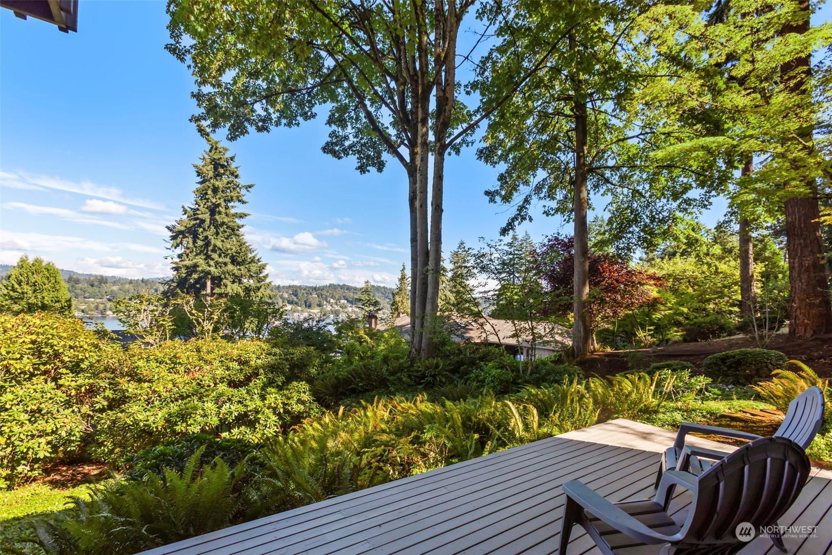 6244 East Mercer Way Mercer Island, WA 98040 - Photo 34 of 40 a view of a chairs in a roof deck with wooden fence