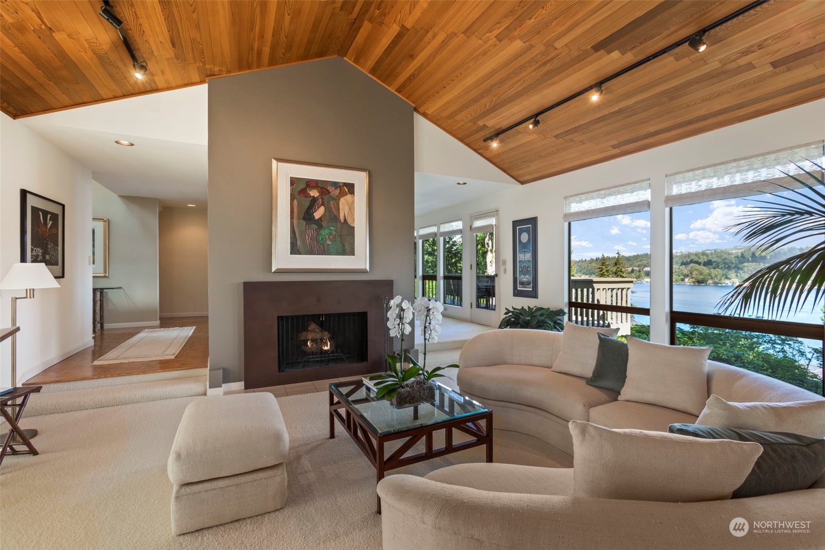 6244 East Mercer Way Mercer Island, WA 98040 - Photo 6 of 40 a living room with furniture and a fireplace