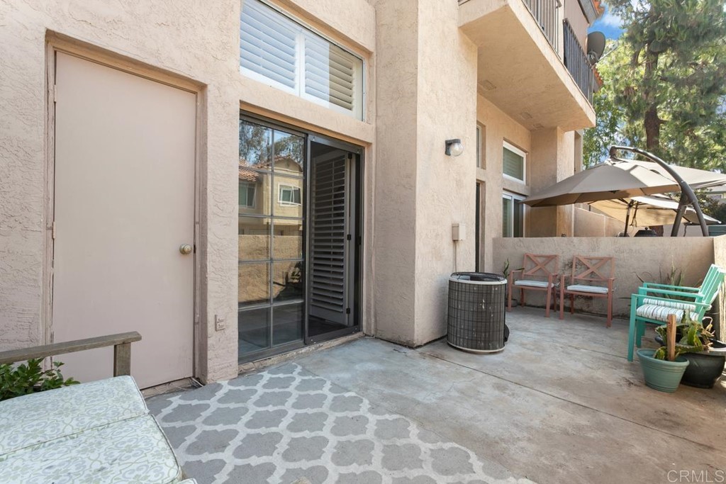1145 Privet Street San Marcos, CA 92069 - Photo 17 of 24 a view of a patio with dining table and chairs