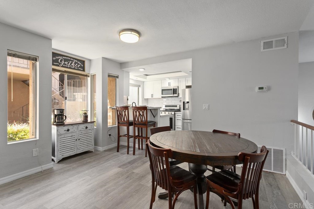 1145 Privet Street San Marcos, CA 92069 - Photo 2 of 24 a view of a dining room with furniture and window