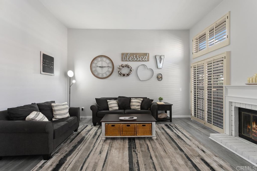 1145 Privet Street San Marcos, CA 92069 - Photo 7 of 24 a living room with furniture and a fireplace