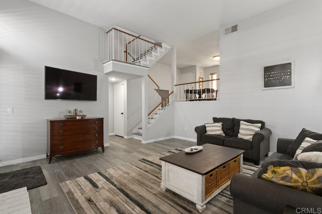 1145 Privet Street San Marcos, CA 92069 - Photo 8 of 24 a living room with furniture and a flat screen tv