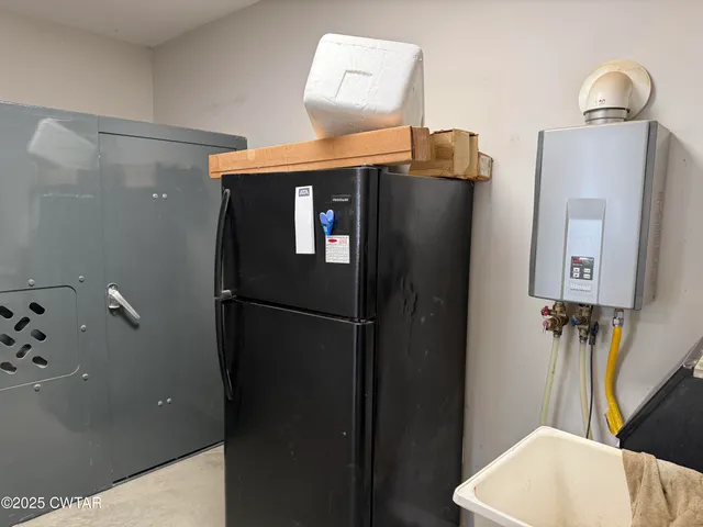 a bathroom with a bathtub and a toilet