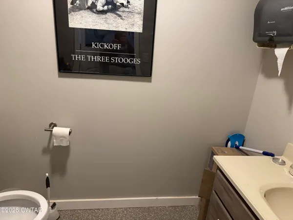 a bathroom with a sink and a vanity