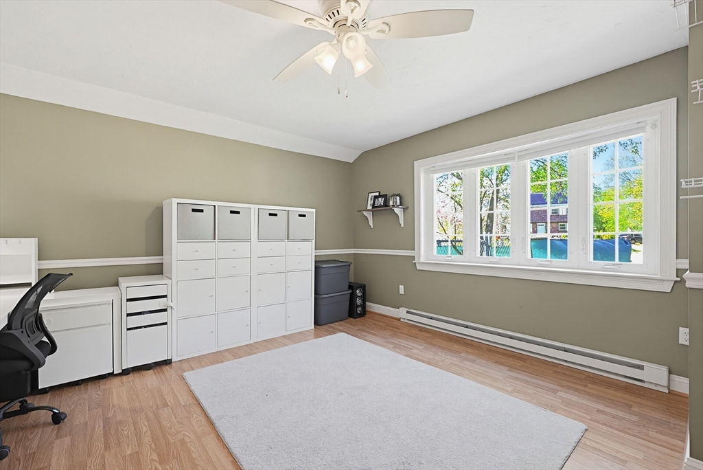 18 Anchorage Road Franklin, MA 02038 - Photo 17 of 42 a bedroom with a bed and a window