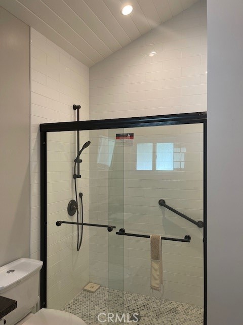 5255 Sylmar Avenue Sherman Oaks, CA 91401 - Photo 12 of 13 a bathroom with a shower and toilet