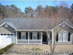 6435 Applewhite Road Fayetteville, NC 28304 - Photo 2 of 10 a front view of a house with a yard
