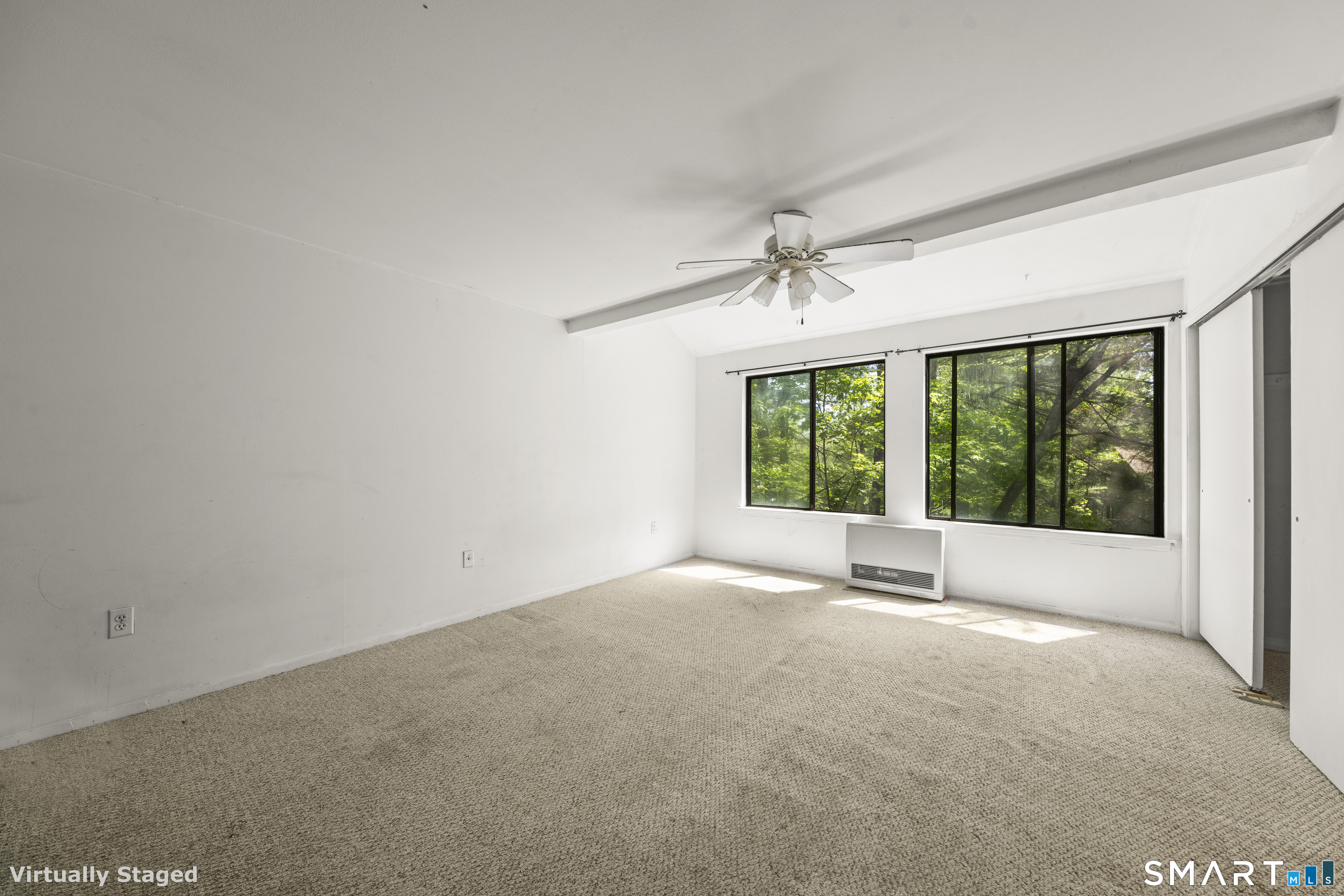 39 Evergreen Road, Unit 39 Torrington, CT 06790 - Photo 23 of 27 a view of an empty room with a window